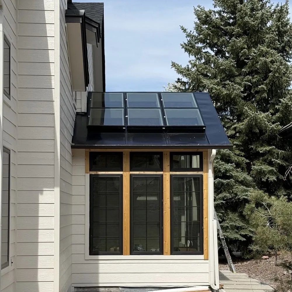 Slide of Jenesis Roofing