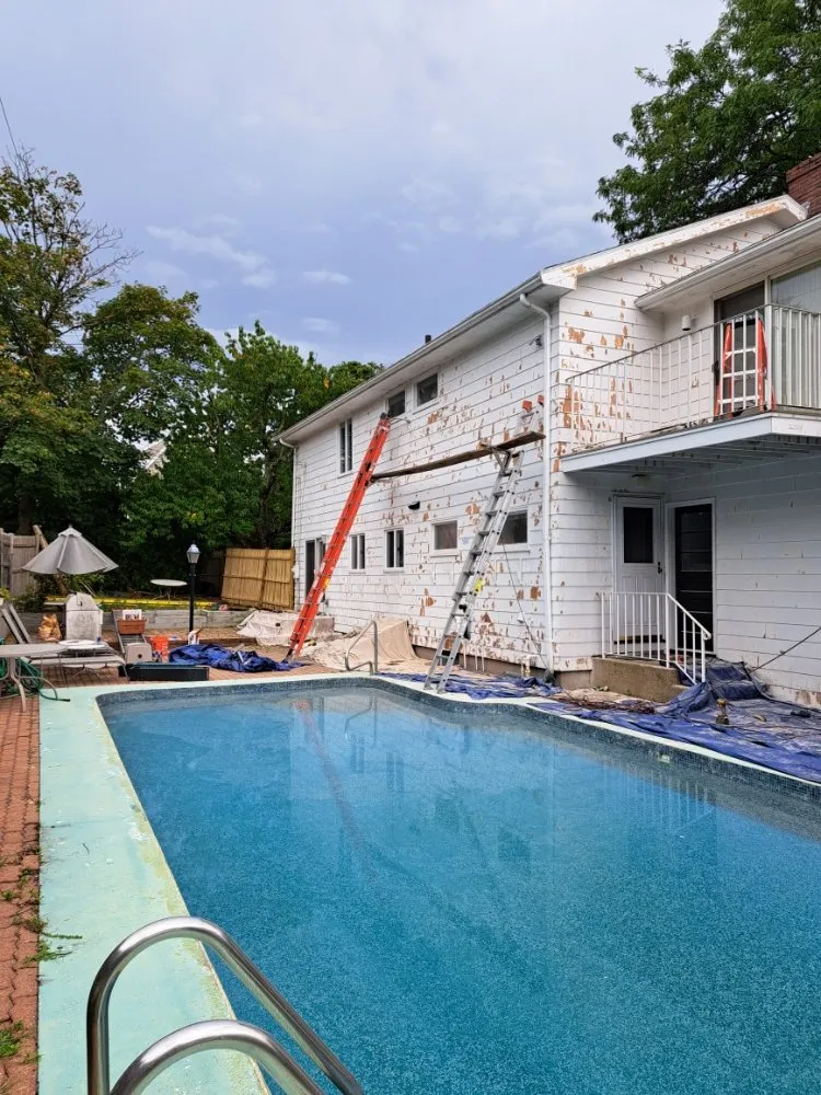 Slide of Jere Construction Roofing