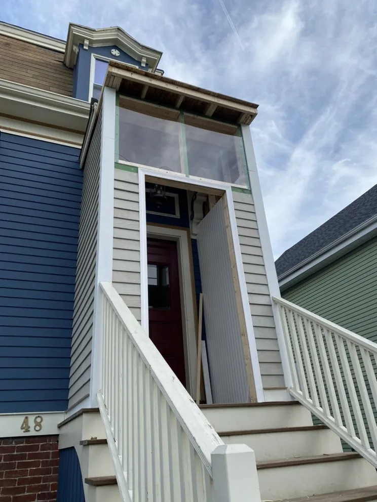 Slide of Jere Construction Roofing