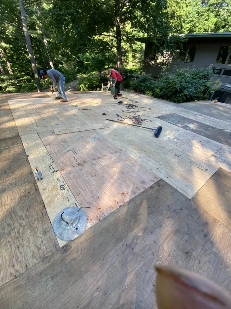 Slide of Jere Construction Roofing