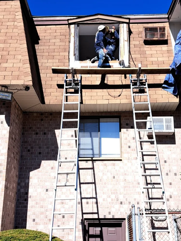 Slide of Jere Construction Roofing