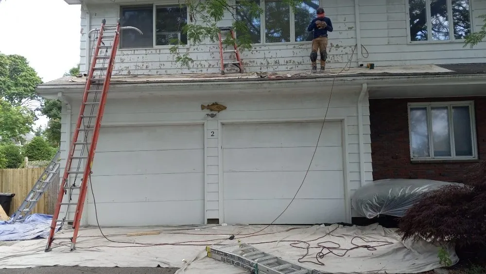 Slide of Jere Construction Roofing