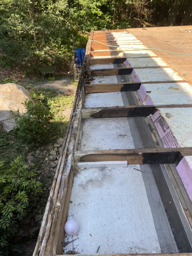 Slide of Jere Construction Roofing