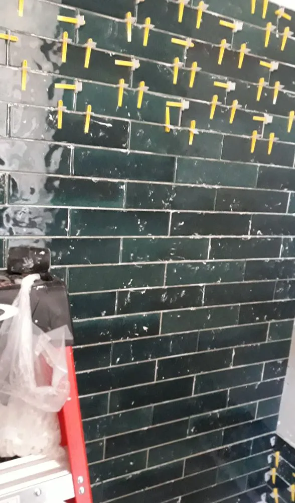 Slide of Jere Construction Roofing