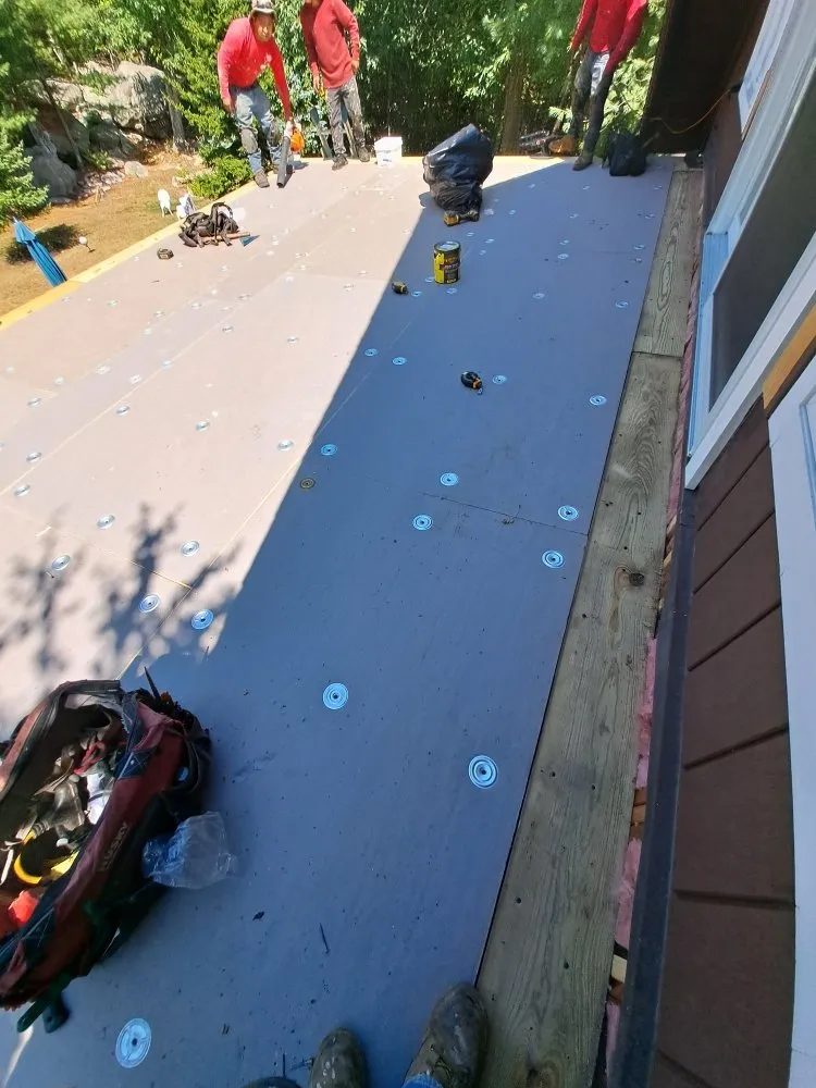 Slide of Jere Construction Roofing