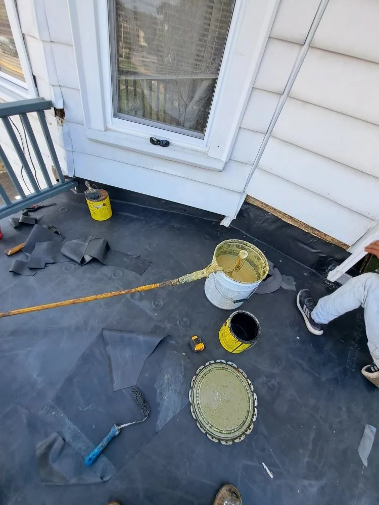 Slide of Jere Construction Roofing