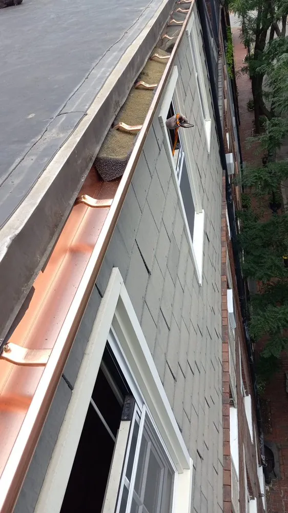 Slide of Jere Construction Roofing