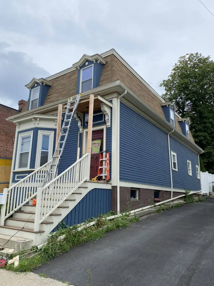 Slide of Jere Construction Roofing