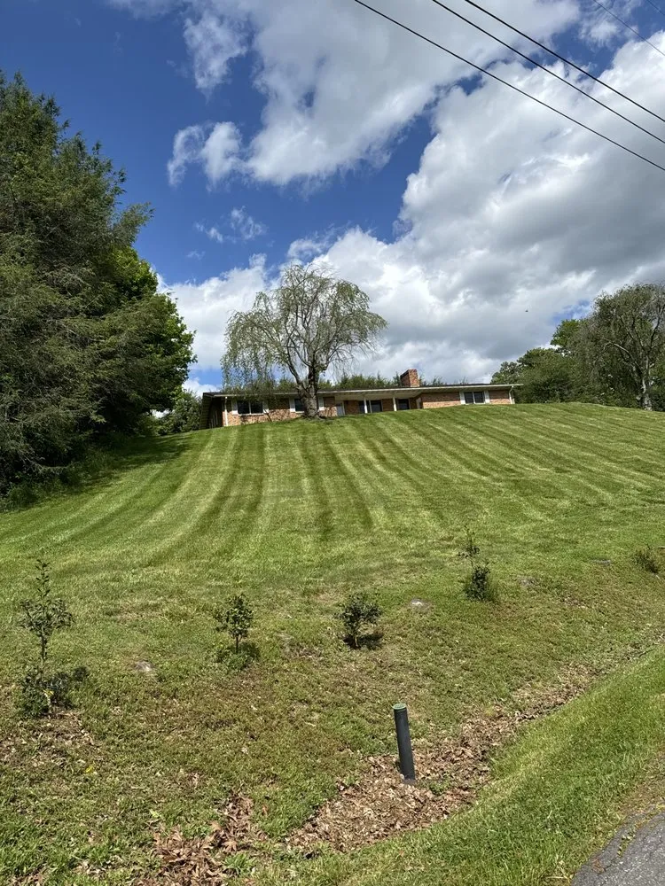 Slide of Jerrys Lawn and Roofing