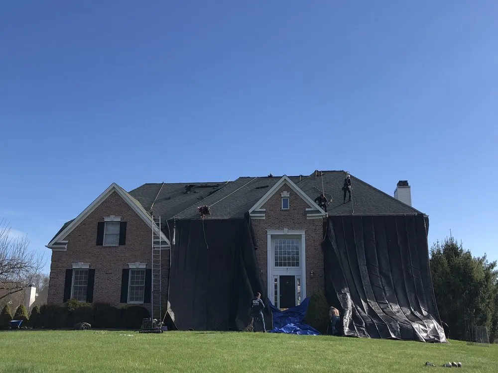 Slide of Jersey Roofing