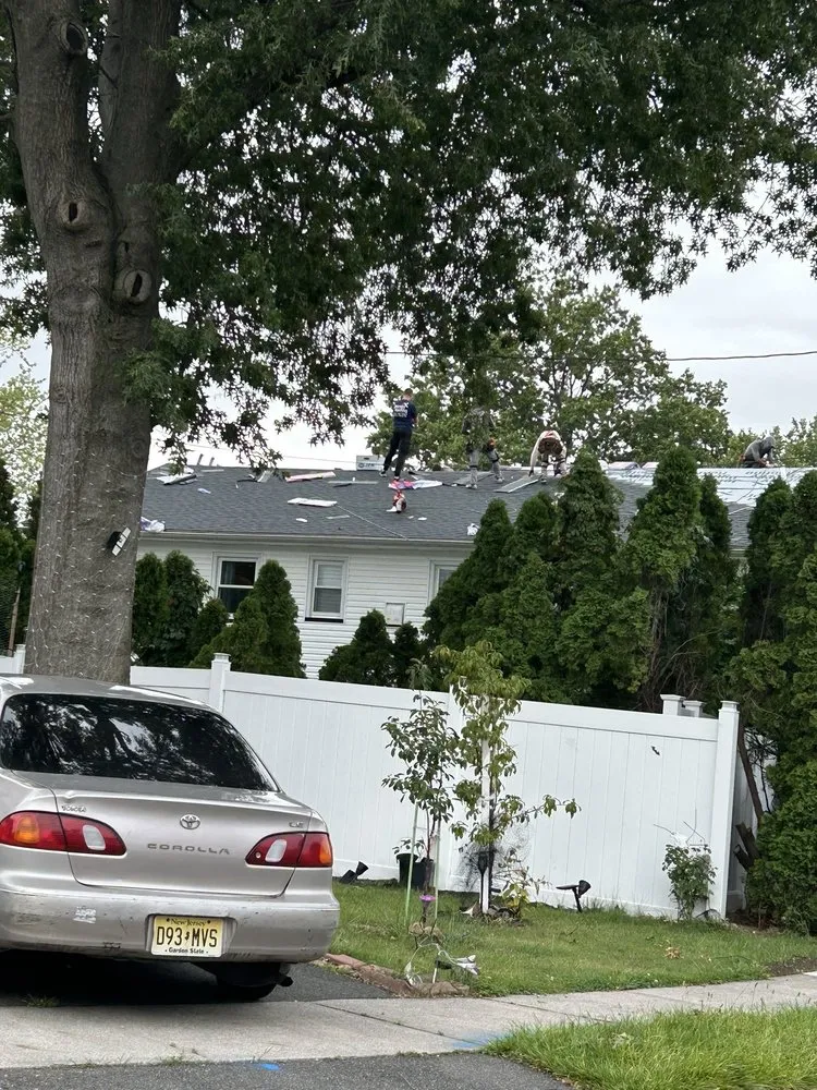 Slide of Jersey Roofing