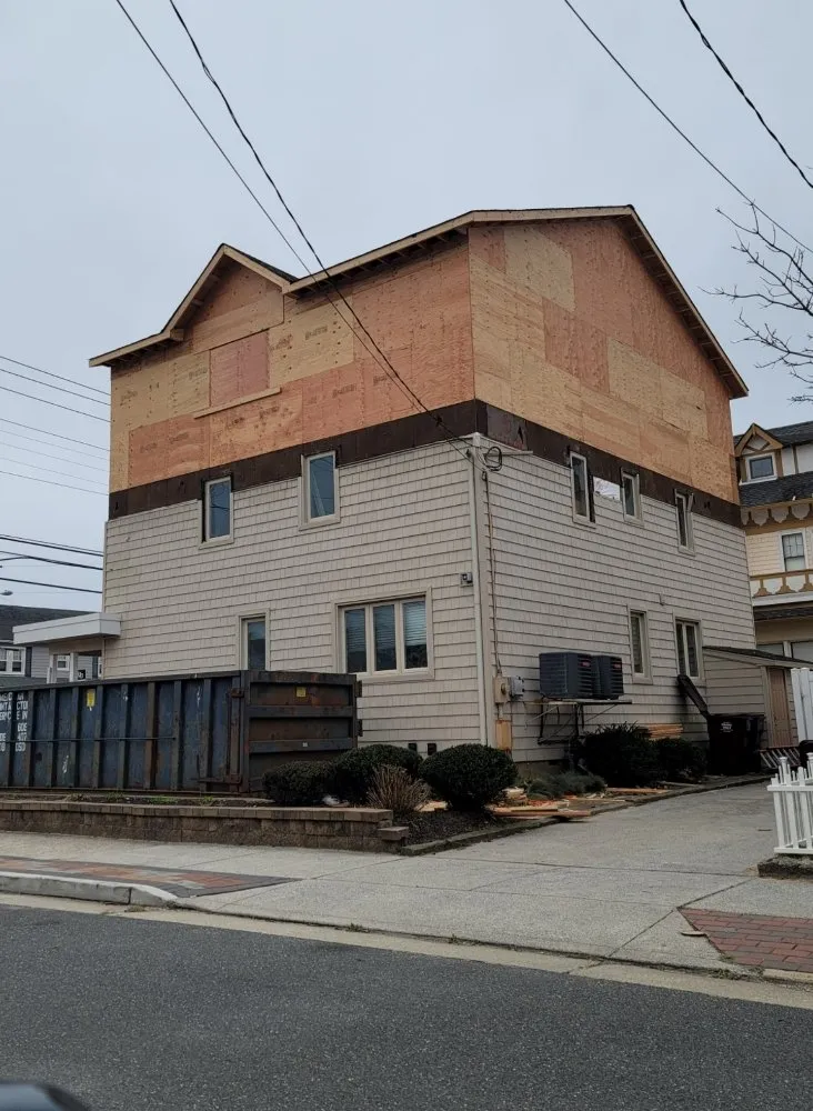 Slide of Jersey's Best Roofing Contractor