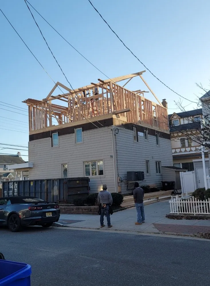 Slide of Jersey's Best Roofing Contractor