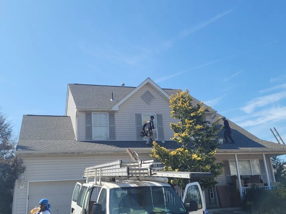 Slide of Jersey's Best Roofing Contractor