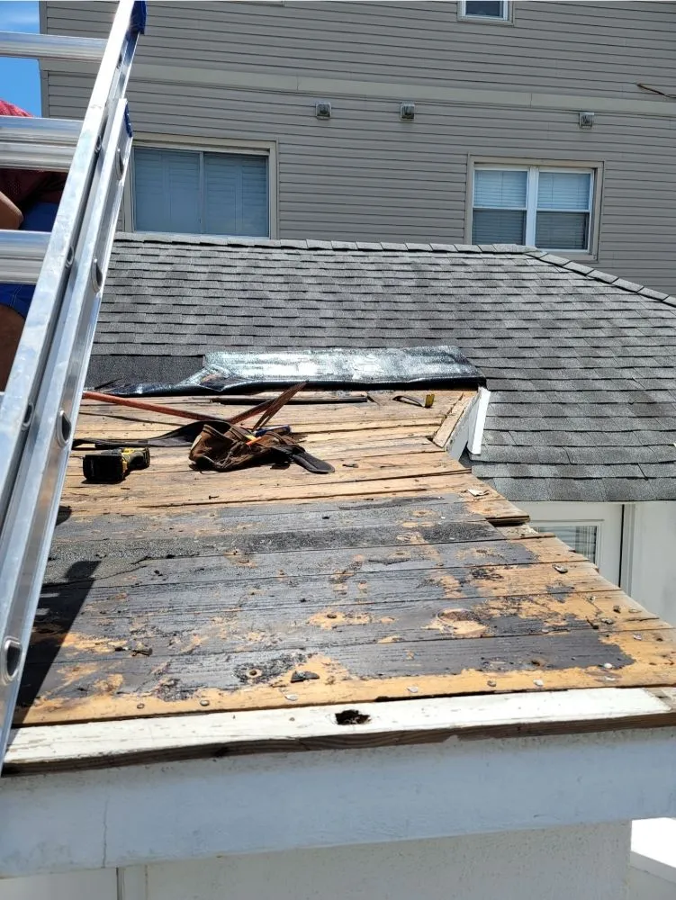 Slide of Jersey's Best Roofing Contractor