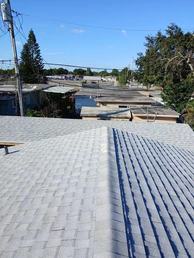 Slide of Jesus Cruz Roofing