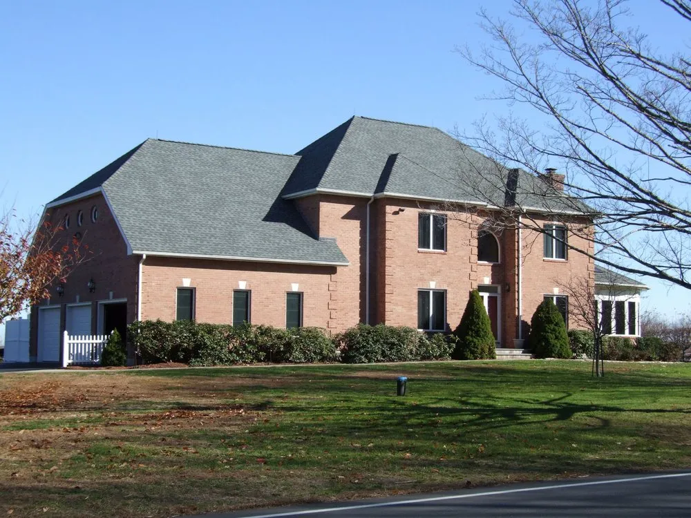Slide of JFK Roofing