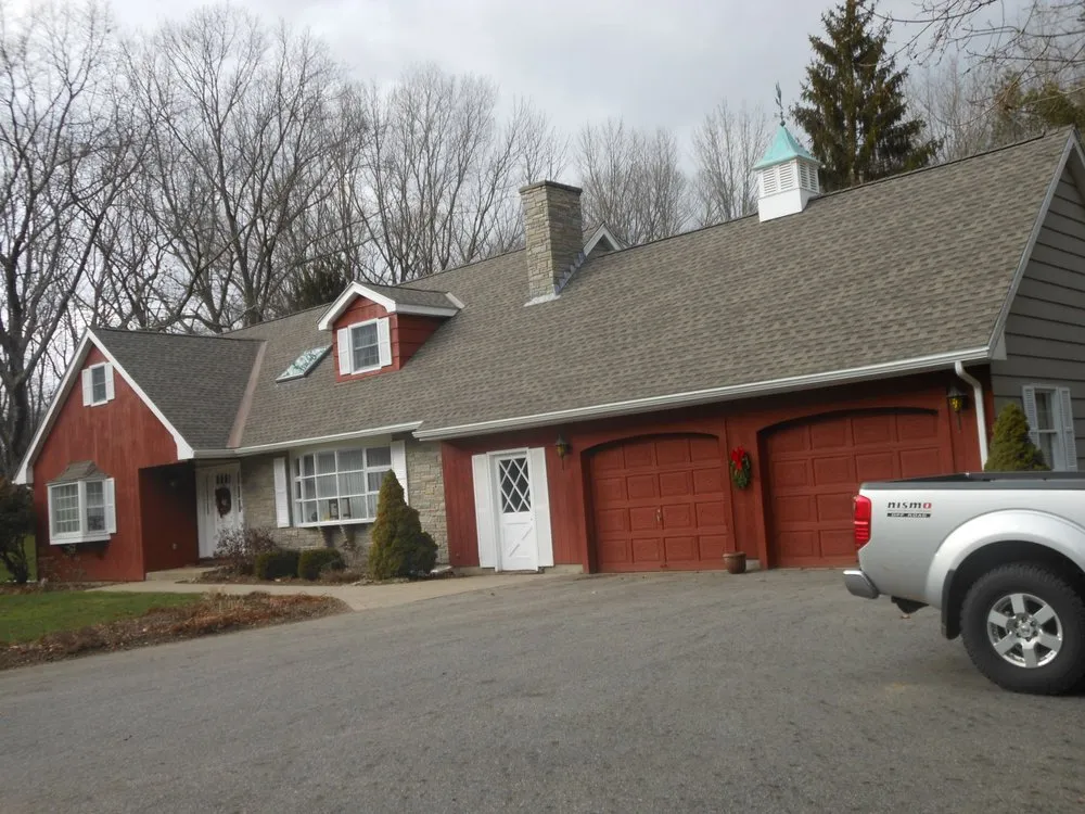 Slide of JFK Roofing