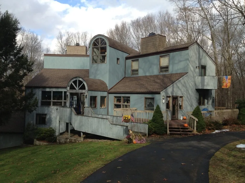 Slide of JFK Roofing