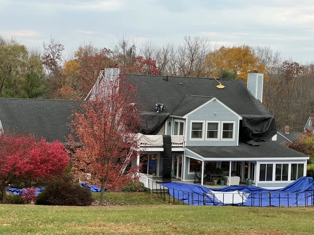 Slide of JFK Roofing