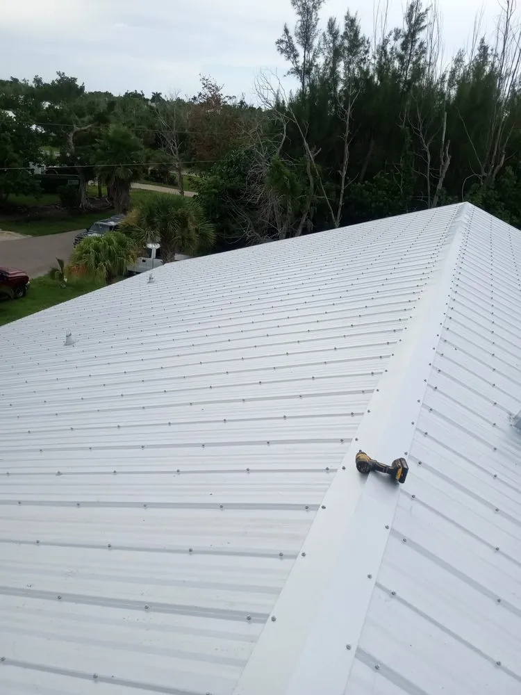 Slide of JG Helms Roofing