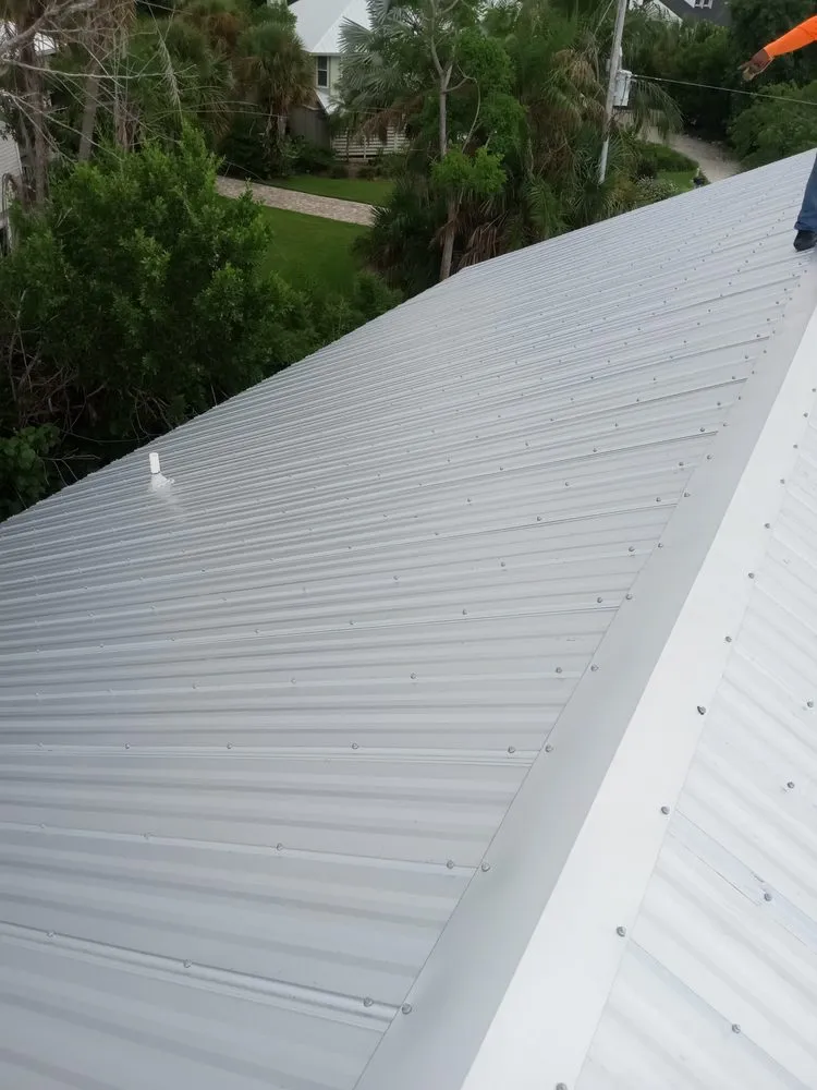 Slide of JG Helms Roofing