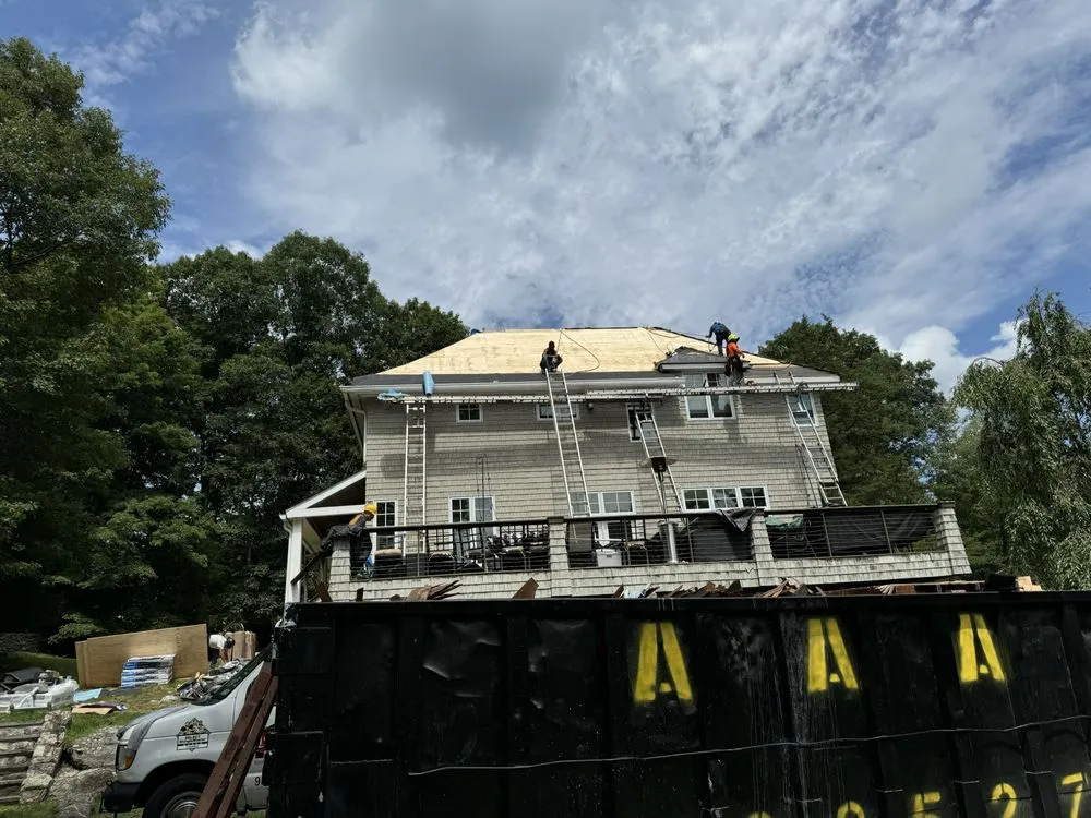 Slide of J&G Roofing