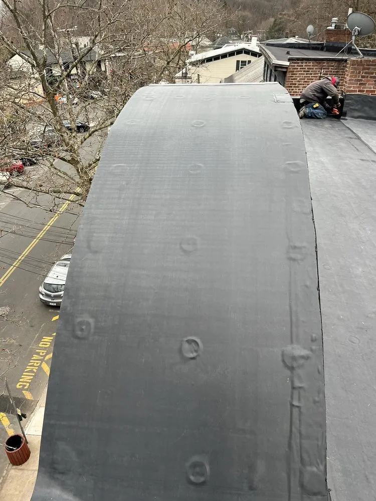 Slide of J&G Roofing