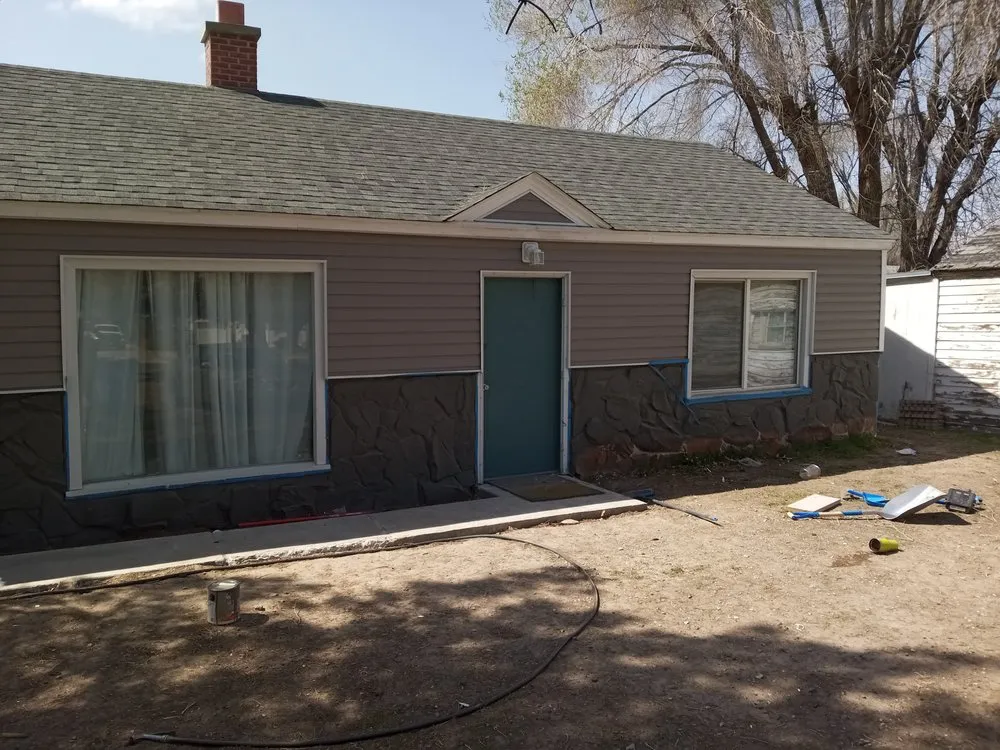 Licensed storm damage roof repair in Daggett, MI by J&H Construction