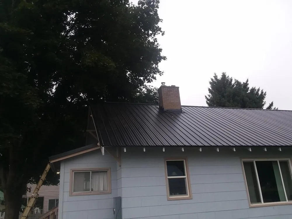 Professional flat roof repair experts serving Daggett, MI - J&H Construction