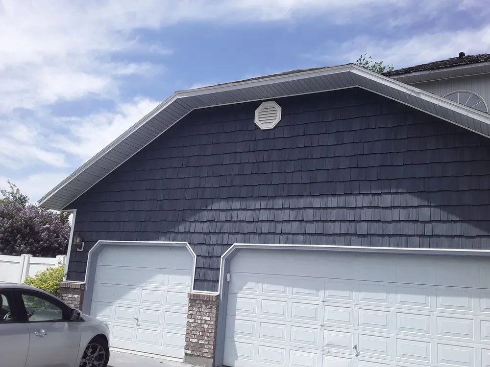 Licensed storm damage roof repair in Daggett, MI - J&H Construction