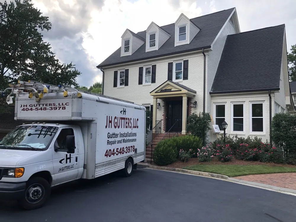 Slide of JH GUTTERS and Roofing