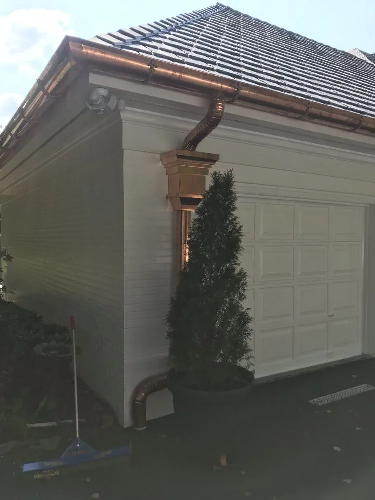 Slide of JH GUTTERS and Roofing