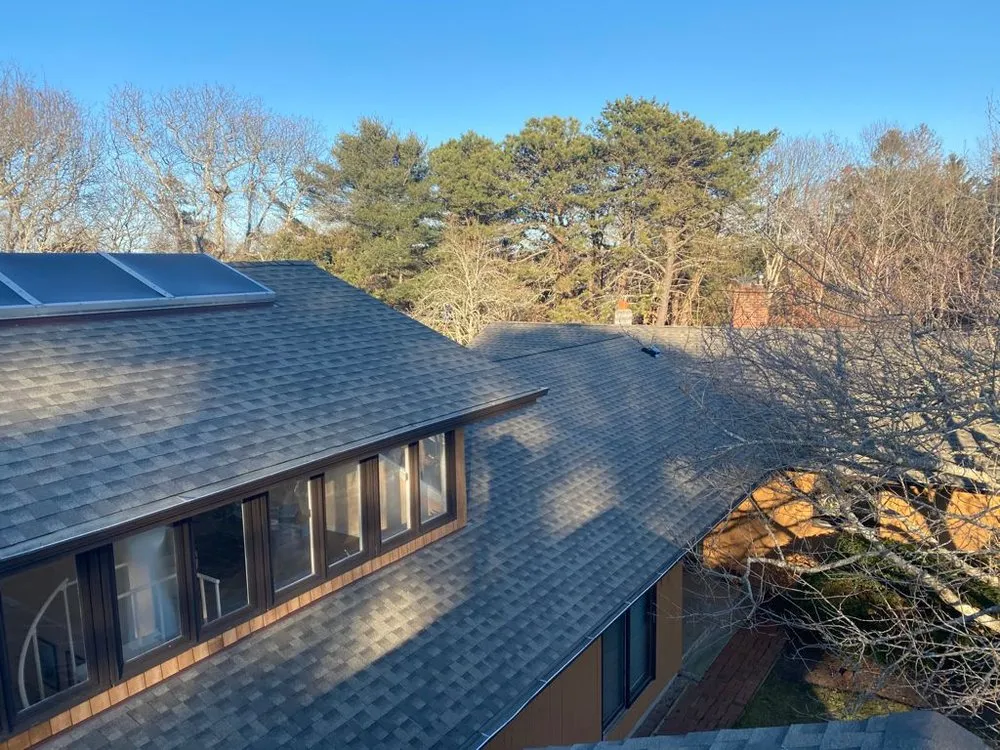 Slide of Ji Roofing & Exteriors