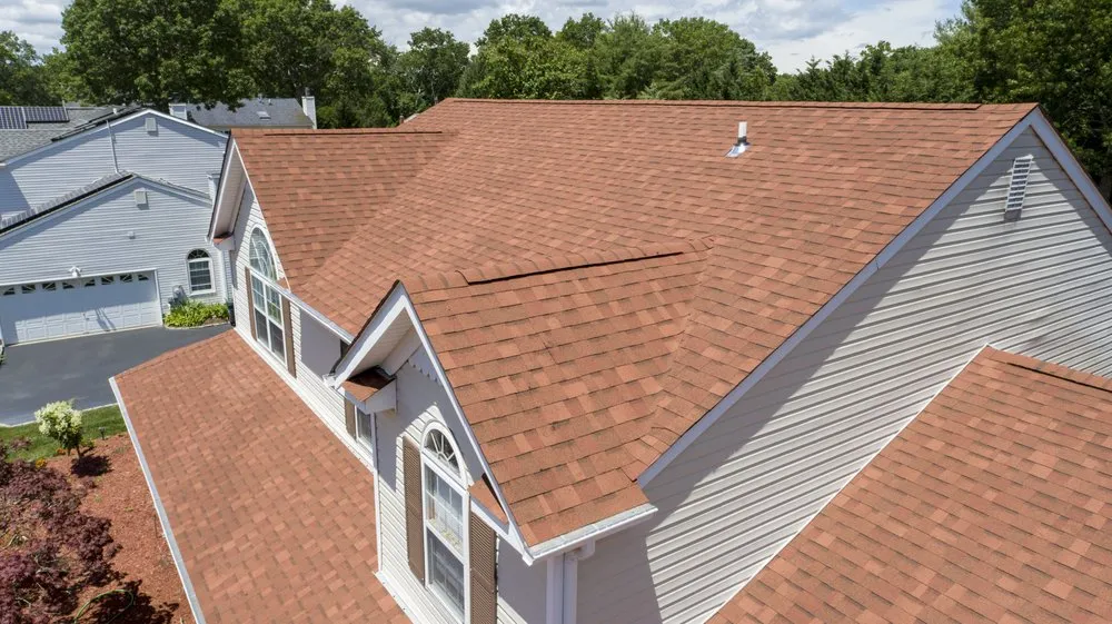 Slide of Ji Roofing & Exteriors