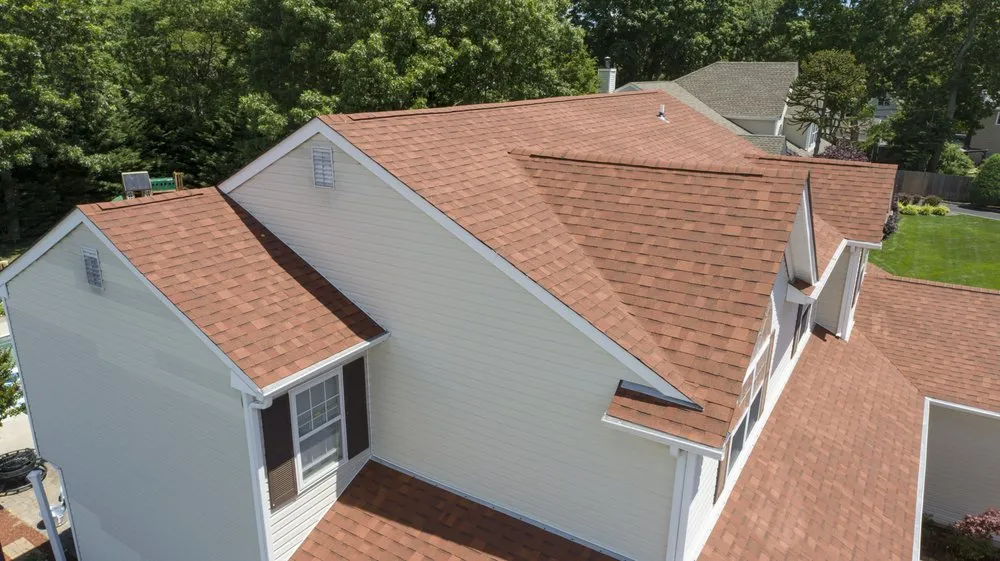 Slide of Ji Roofing & Exteriors