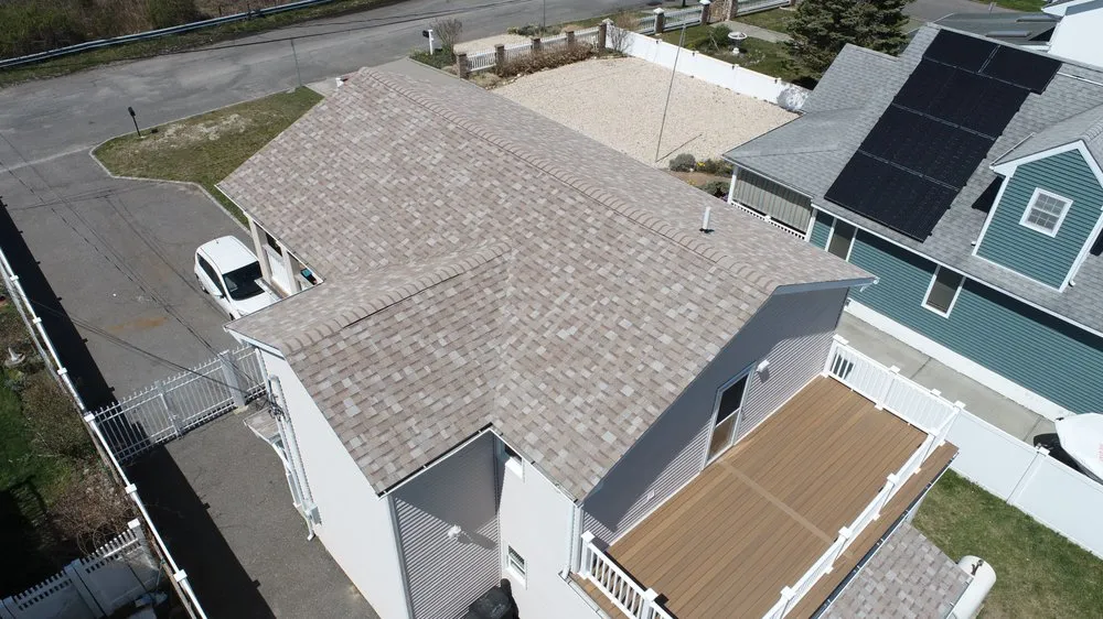 Slide of Ji Roofing & Exteriors