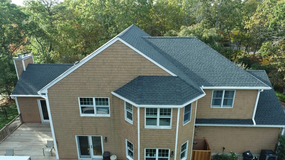 Slide of Ji Roofing & Exteriors