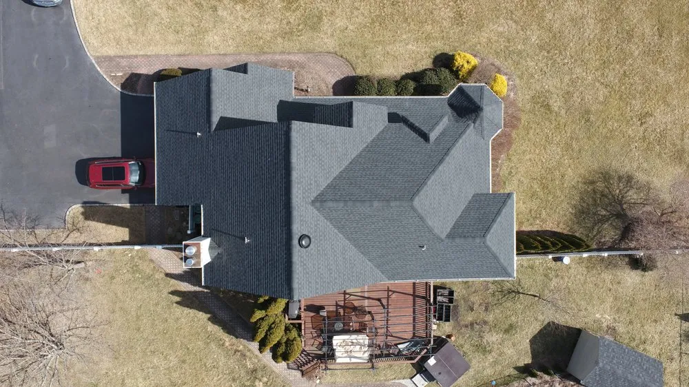 Slide of Ji Roofing & Exteriors