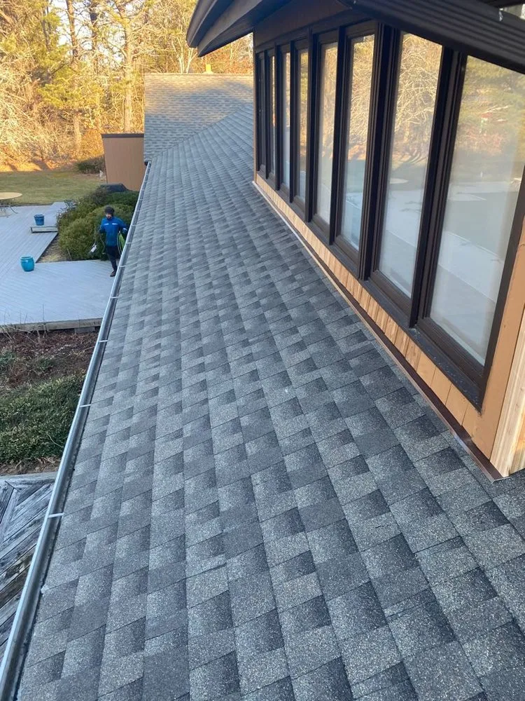 Slide of Ji Roofing & Exteriors