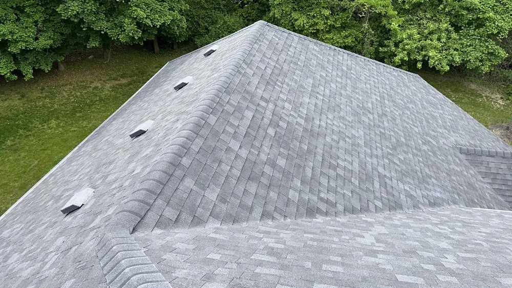 Slide of Ji Roofing & Exteriors