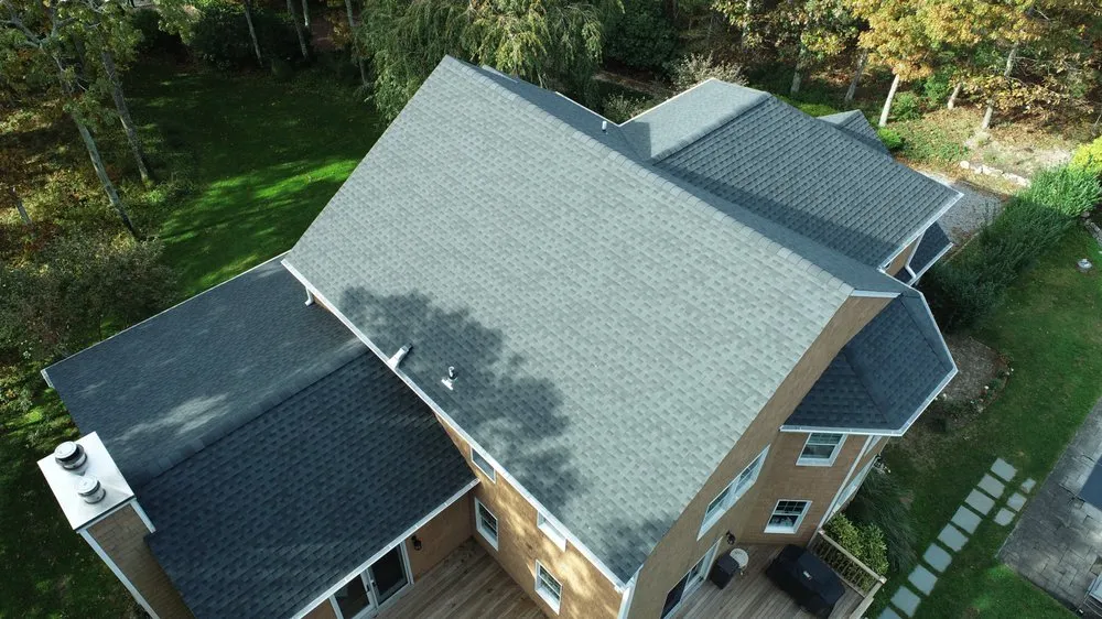 Slide of Ji Roofing & Exteriors