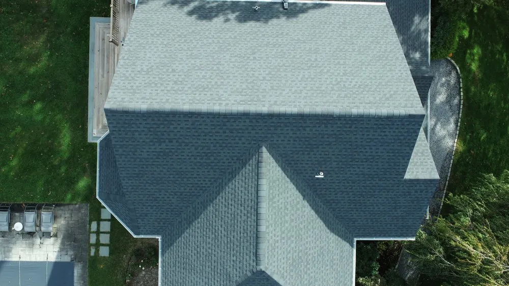 Slide of Ji Roofing & Exteriors