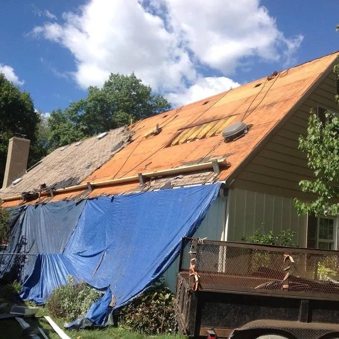 Slide of Jim Hughes Roofing and Gutters