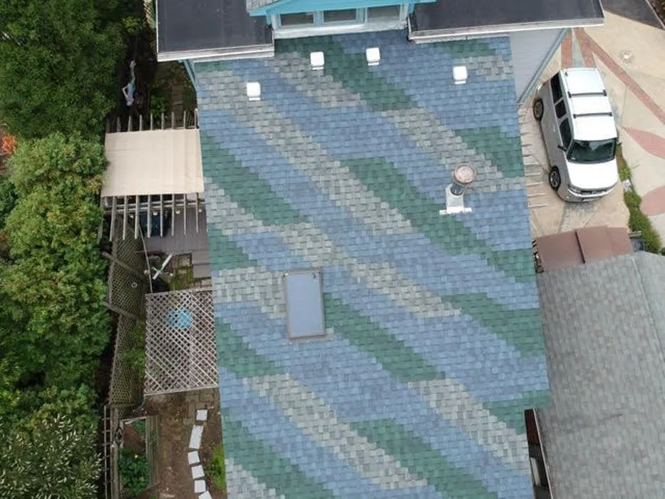 Slide of Jim Hughes Roofing and Gutters