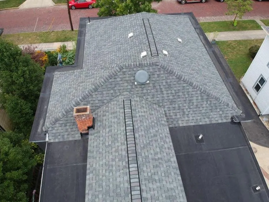 Slide of Jim Hughes Roofing and Gutters