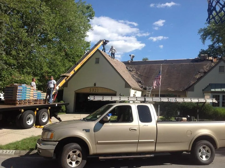 Slide of Jim Hughes Roofing and Gutters