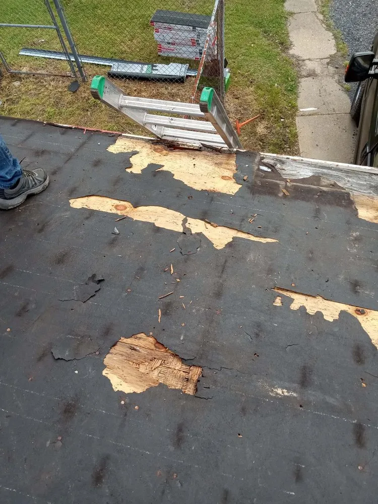 Slide of Jimenez Roofing