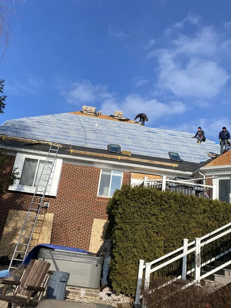 Slide of Jimmy Roofing and More