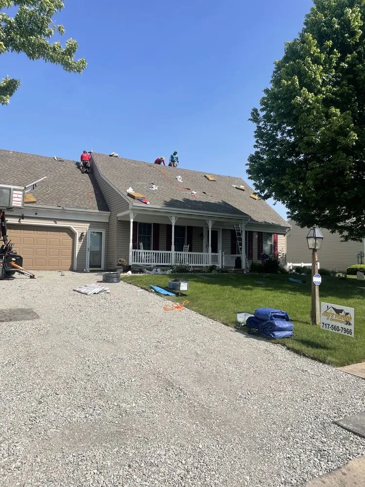 Slide of Jim's Paving & Roofing